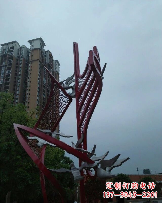 漯河不锈钢祥云纹船帆雕塑
