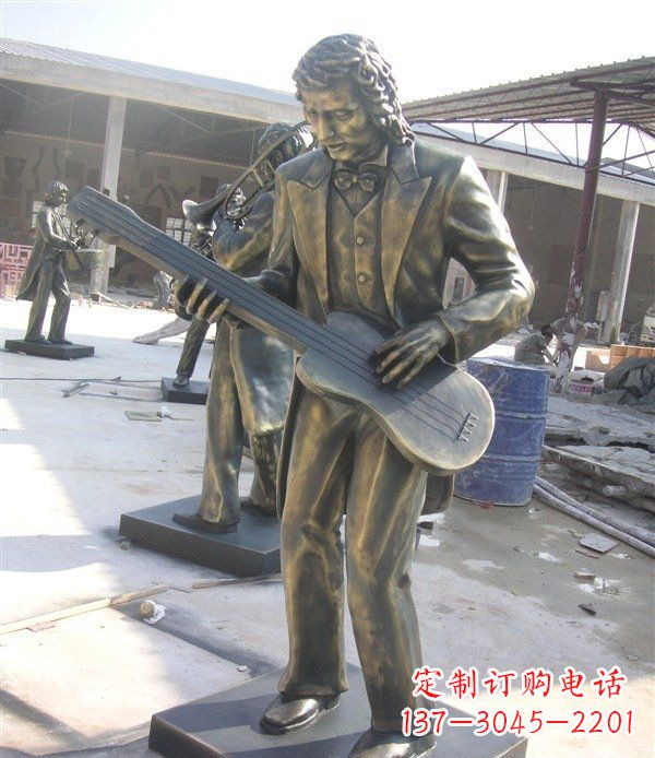漯河西方人物铜吉他雕塑