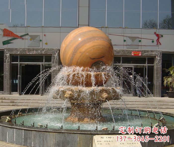 漯河石来运转球晚霞红风水球石雕