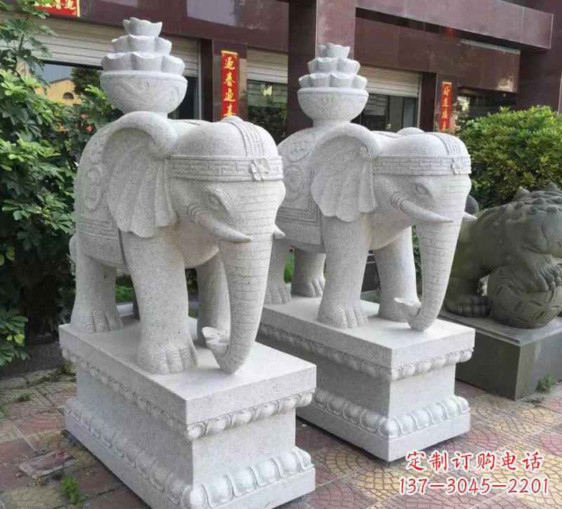 漯河驮元宝的大象石雕