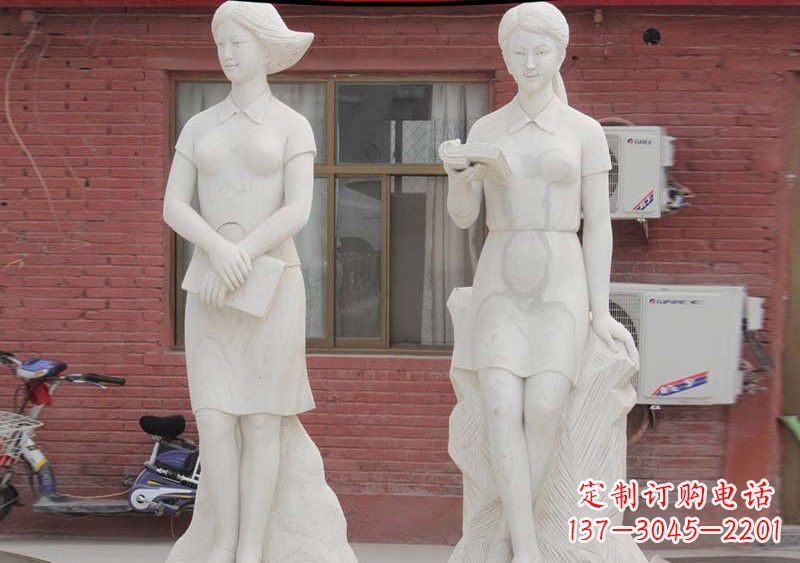 漯河校园拿书本的学生石雕